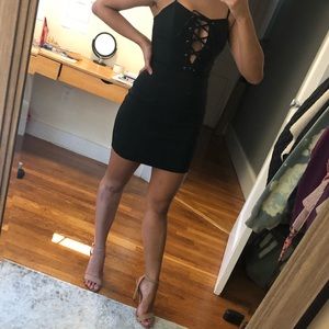 Mini lace up black dress